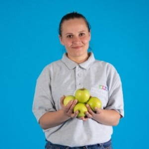 Happy Pro-Force Employee Holding Apples
